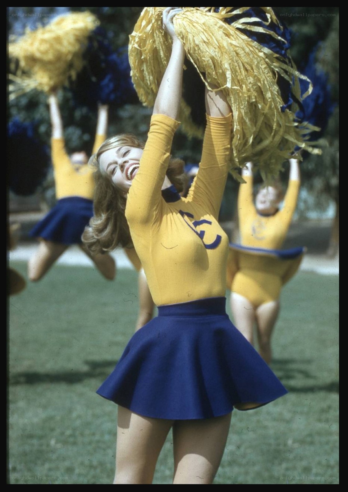 Cheerleaders performing outdoors