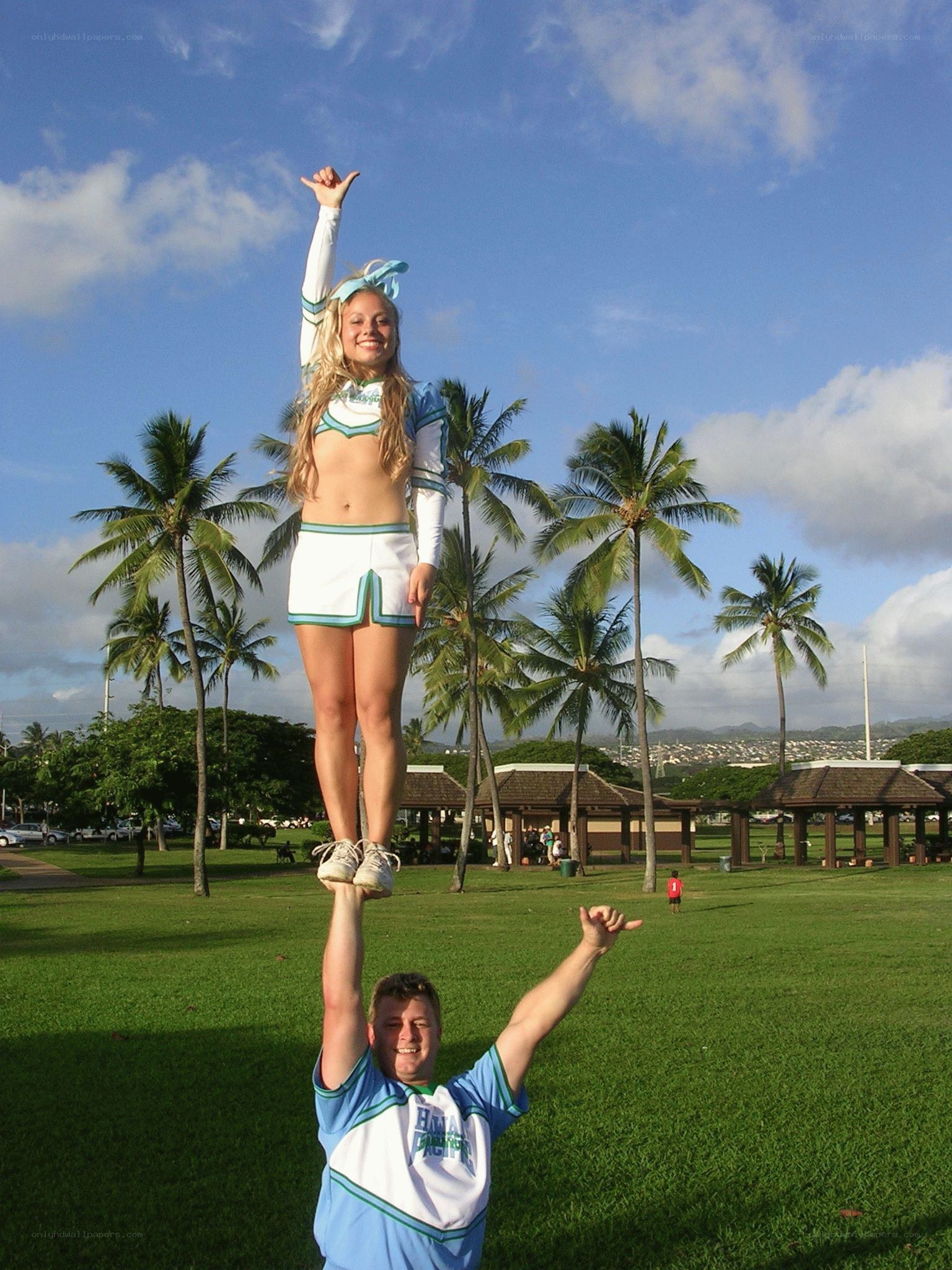 Cheerleaders performing stunt