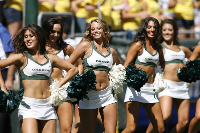 Cheerleaders Performing — White, Energetic, Afternoon, Photograph