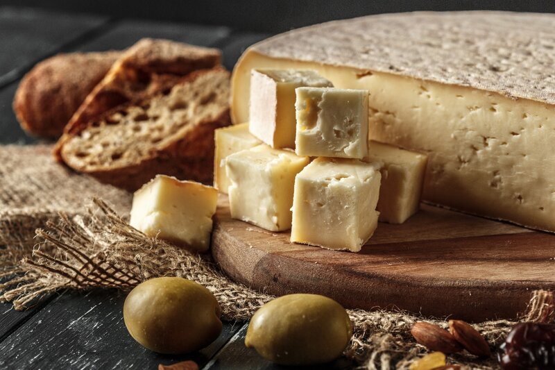 Cheese and Bread on Wood