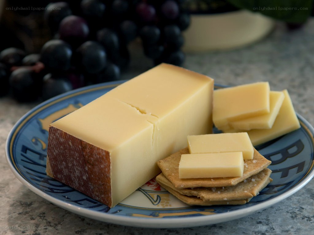 cheese and crackers with grapes