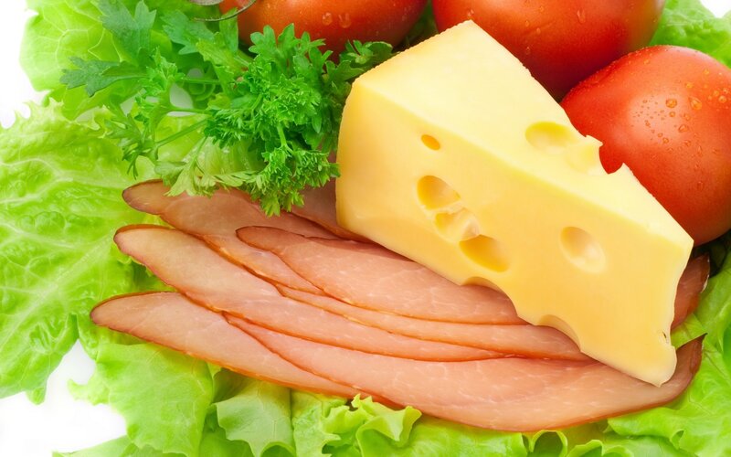 Cheese and deli meats on lettuce
