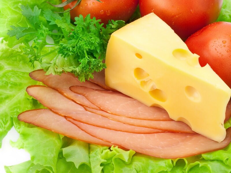 Cheese and deli meats on lettuce