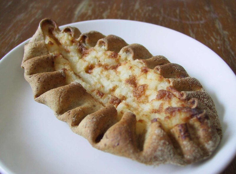 Cheese-filled bread on a plate