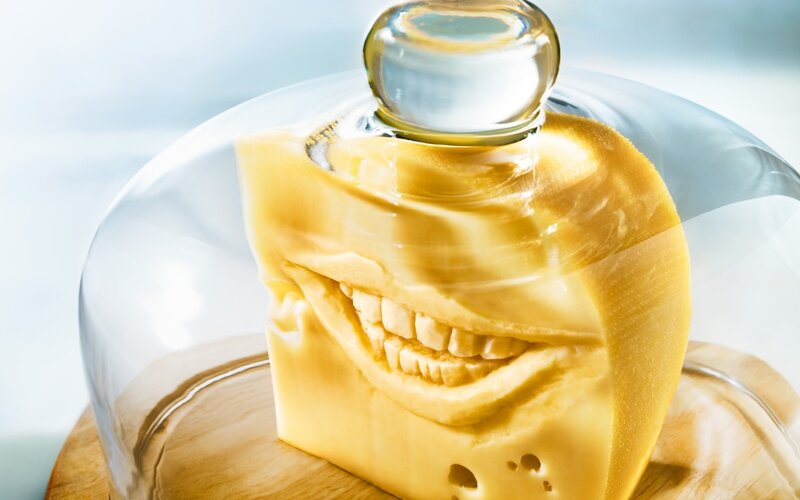 Cheese with Carved Face