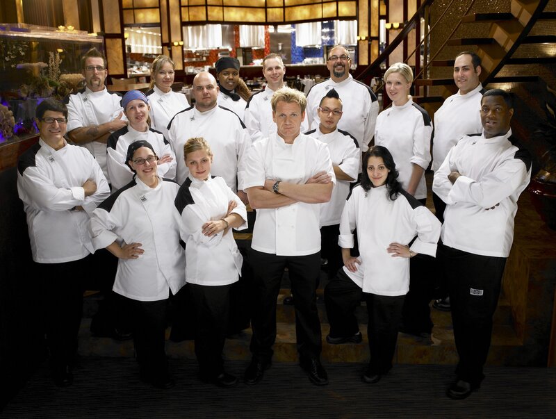 Chef Gordon Ramsay with kitchen staff