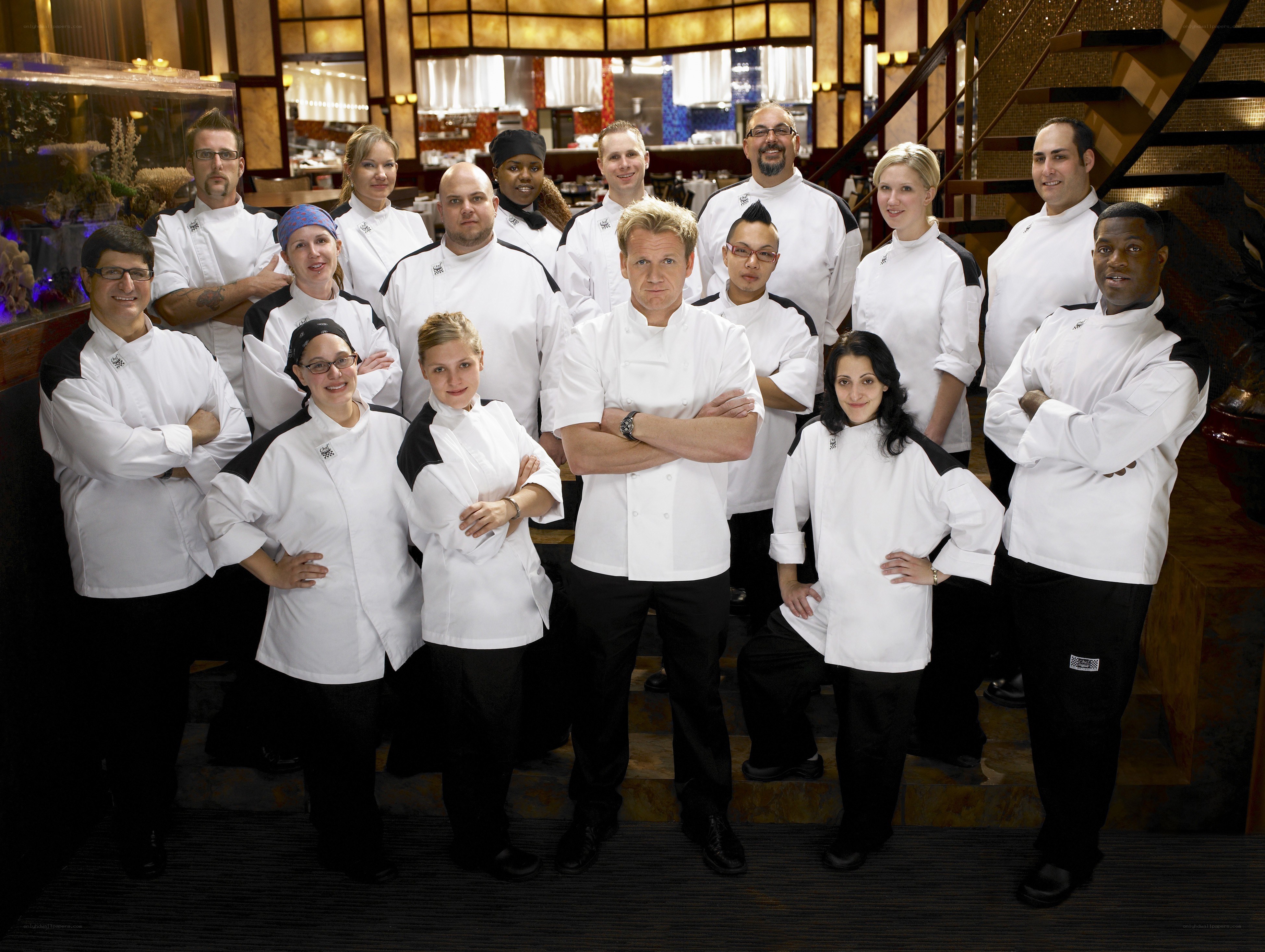 Chef Gordon Ramsay with kitchen staff