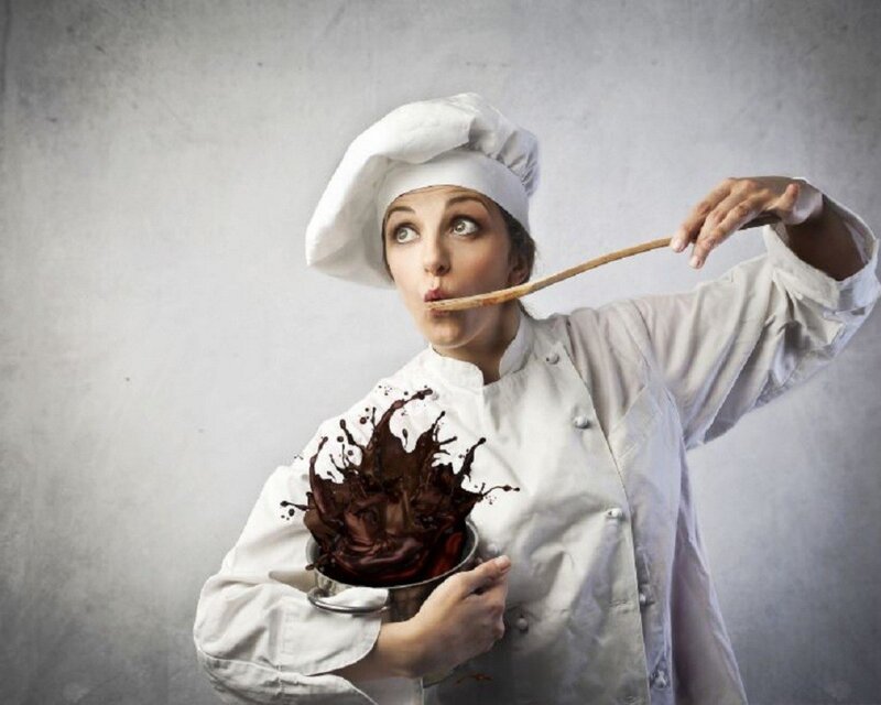 chef tasting chocolate sauce