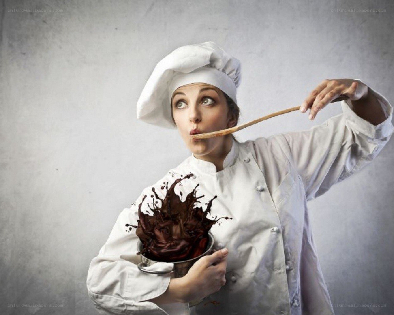 chef tasting chocolate sauce