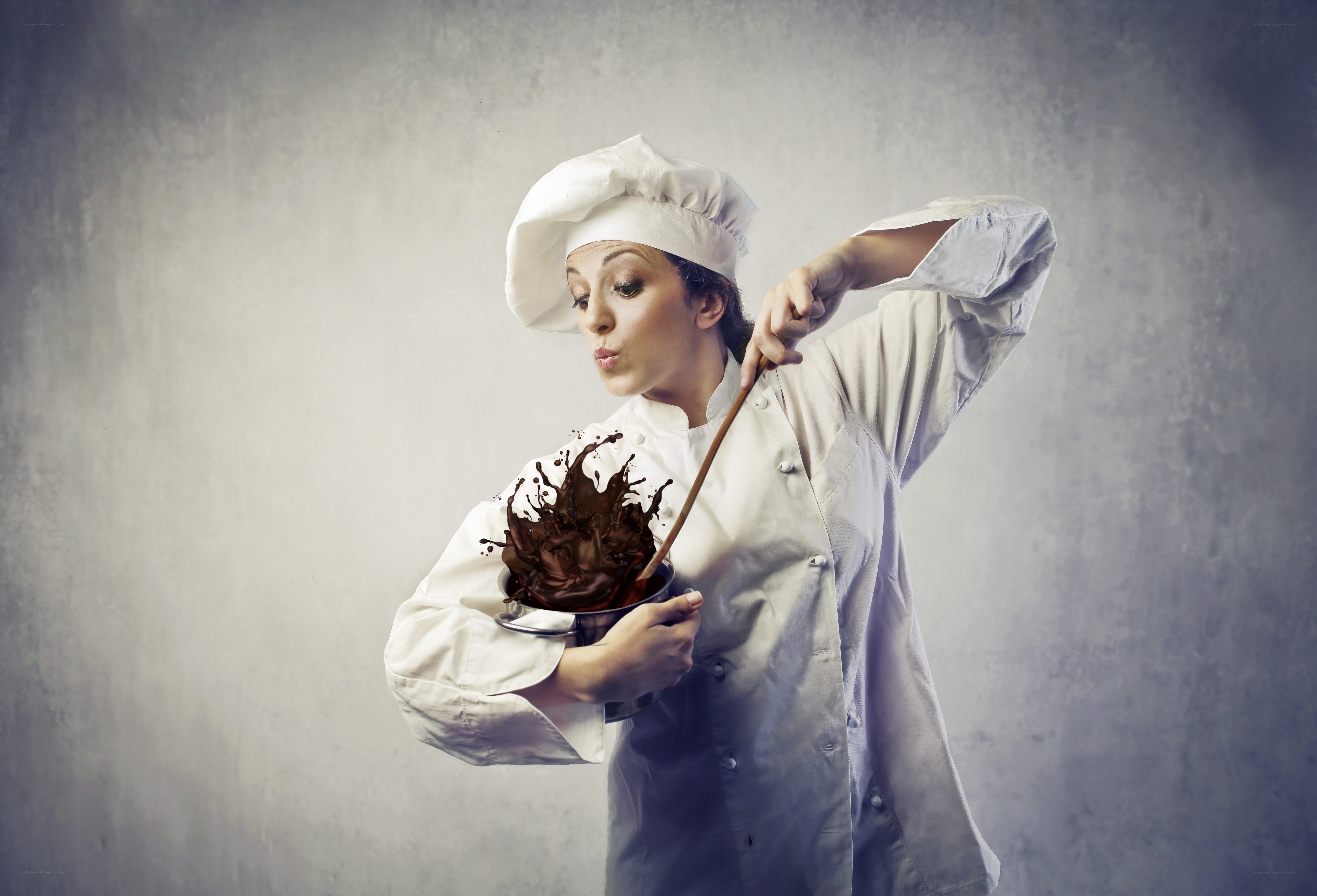 Chef with chocolate splashing