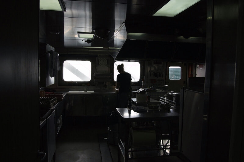 Chef working in a ship's galley