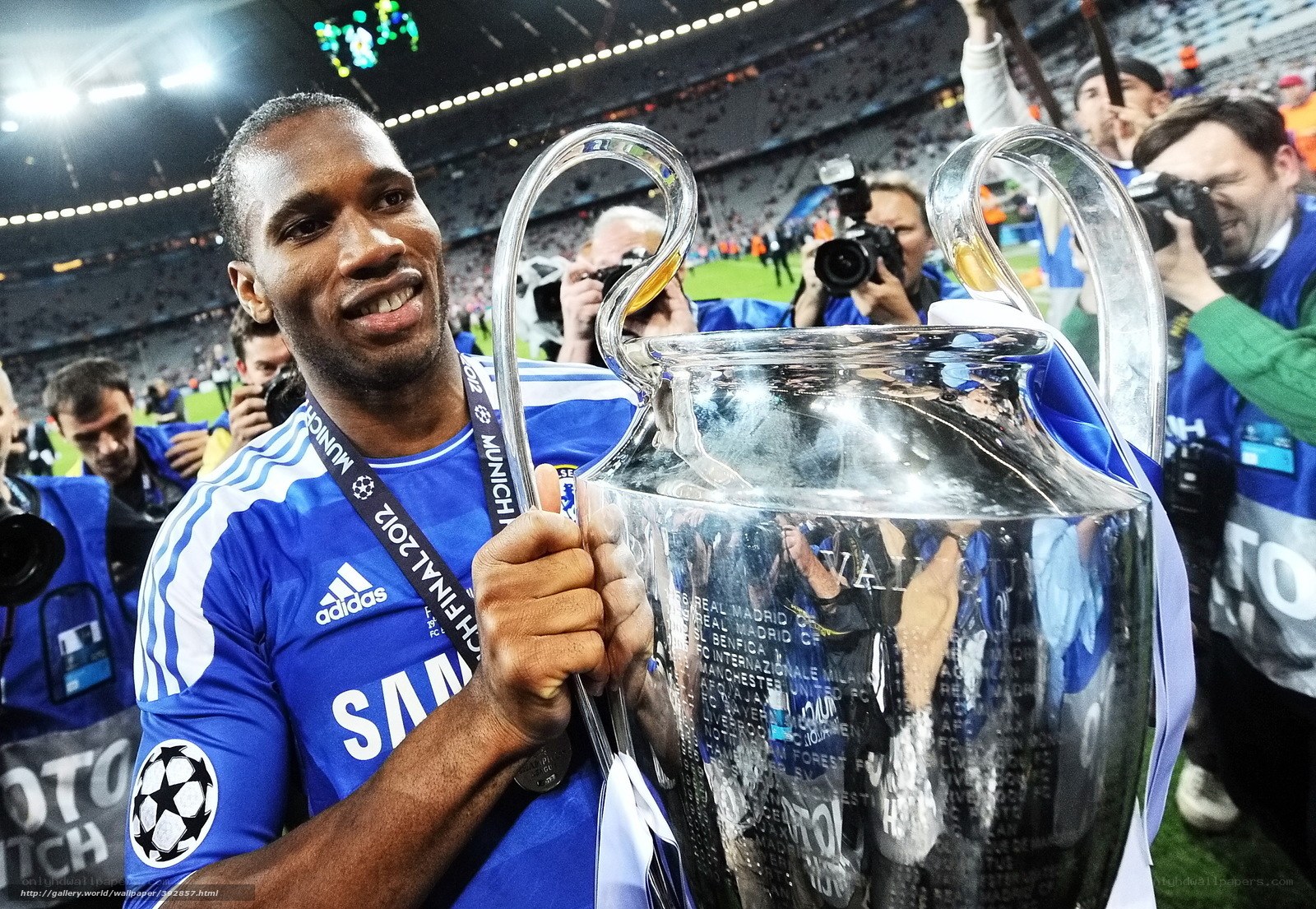 Chelsea player with Champions League trophy