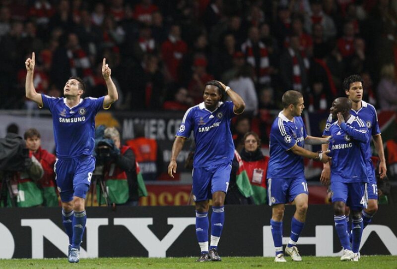 Chelsea players celebrate on the field