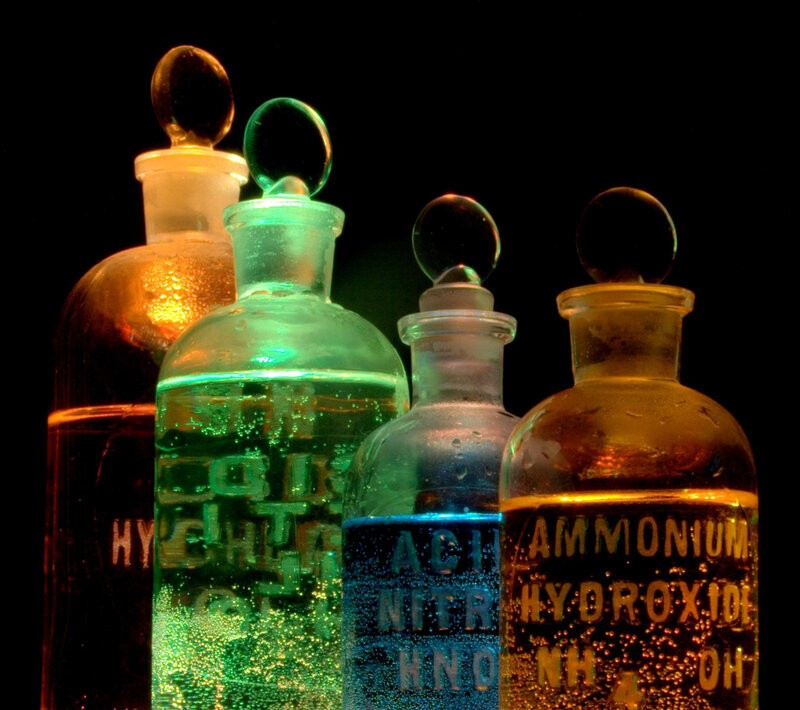 Chemical bottles with colored liquids