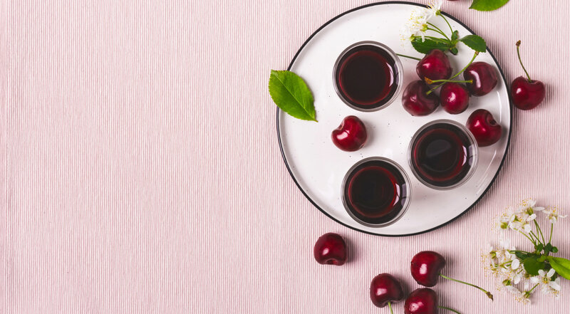 Cherries and Juice on Plate