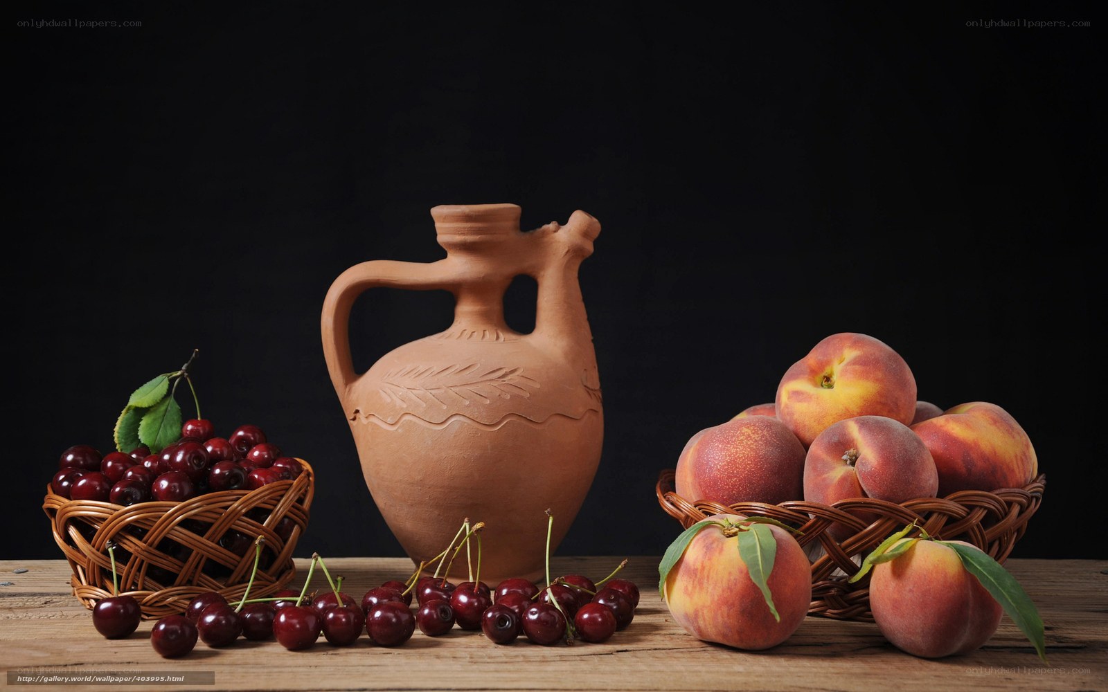 Cherries and peaches in baskets