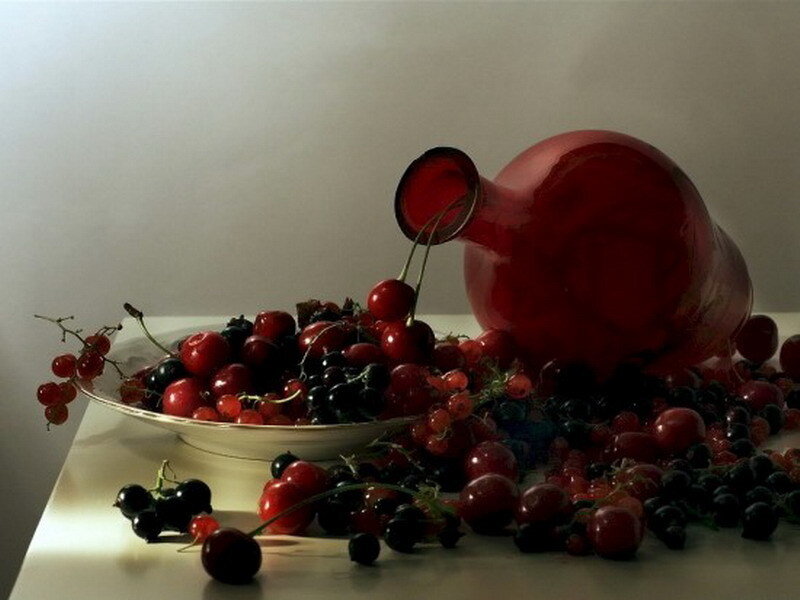 Cherries and red glass bottle