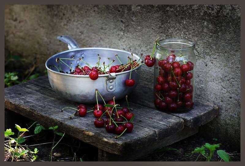 Cherries in a pan and jar