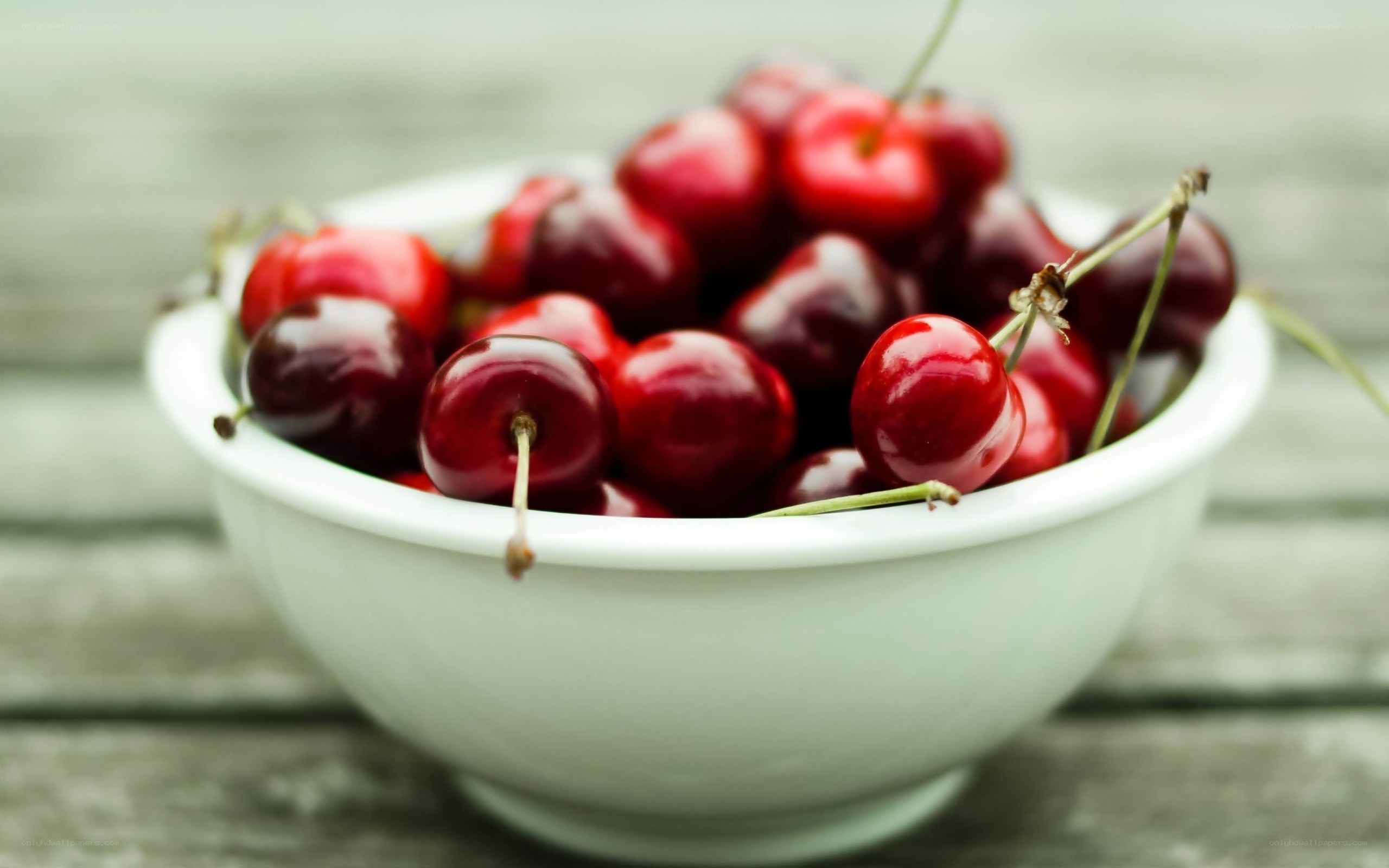 Cherries in a white bowl