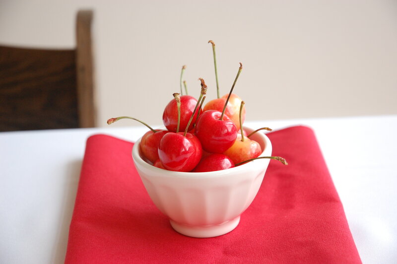 Cherries in a white bowl
