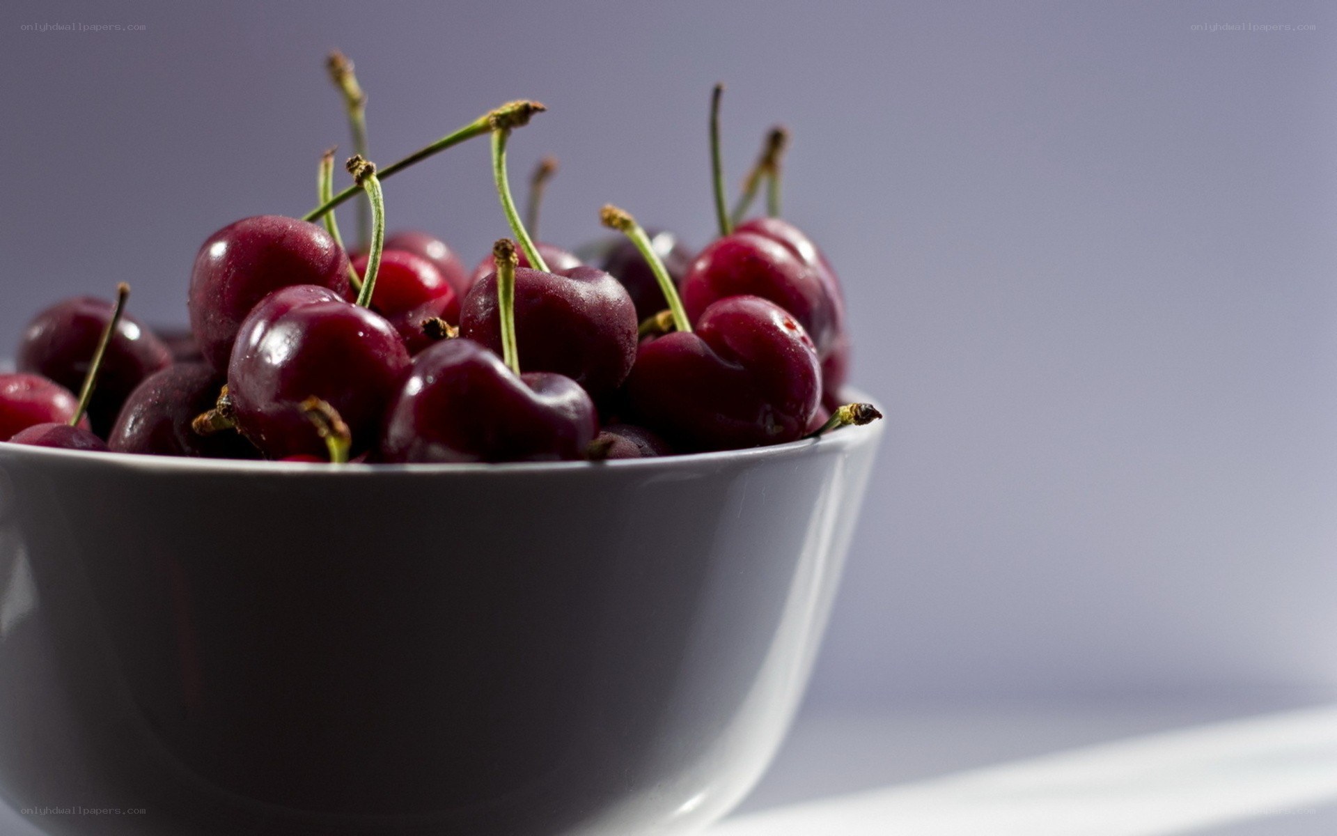 Cherries in a white bowl