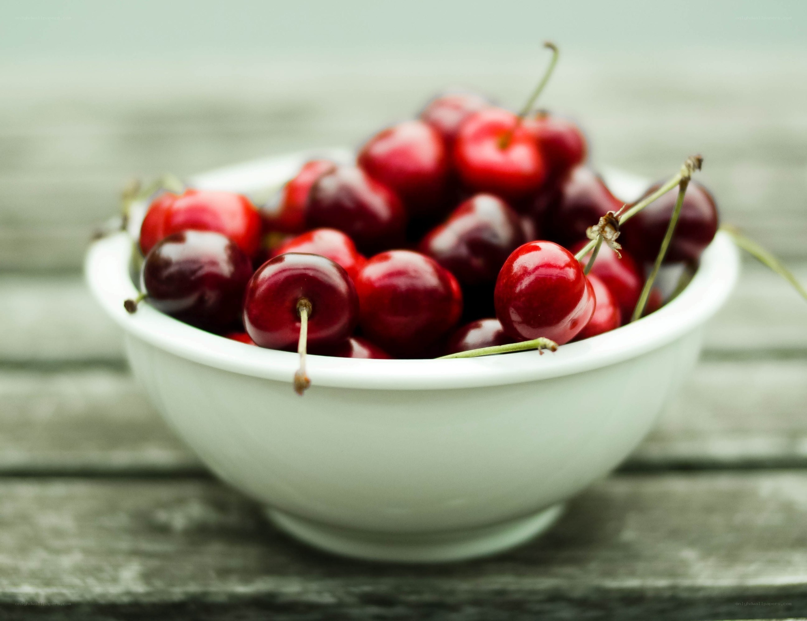 Cherries in a white bowl