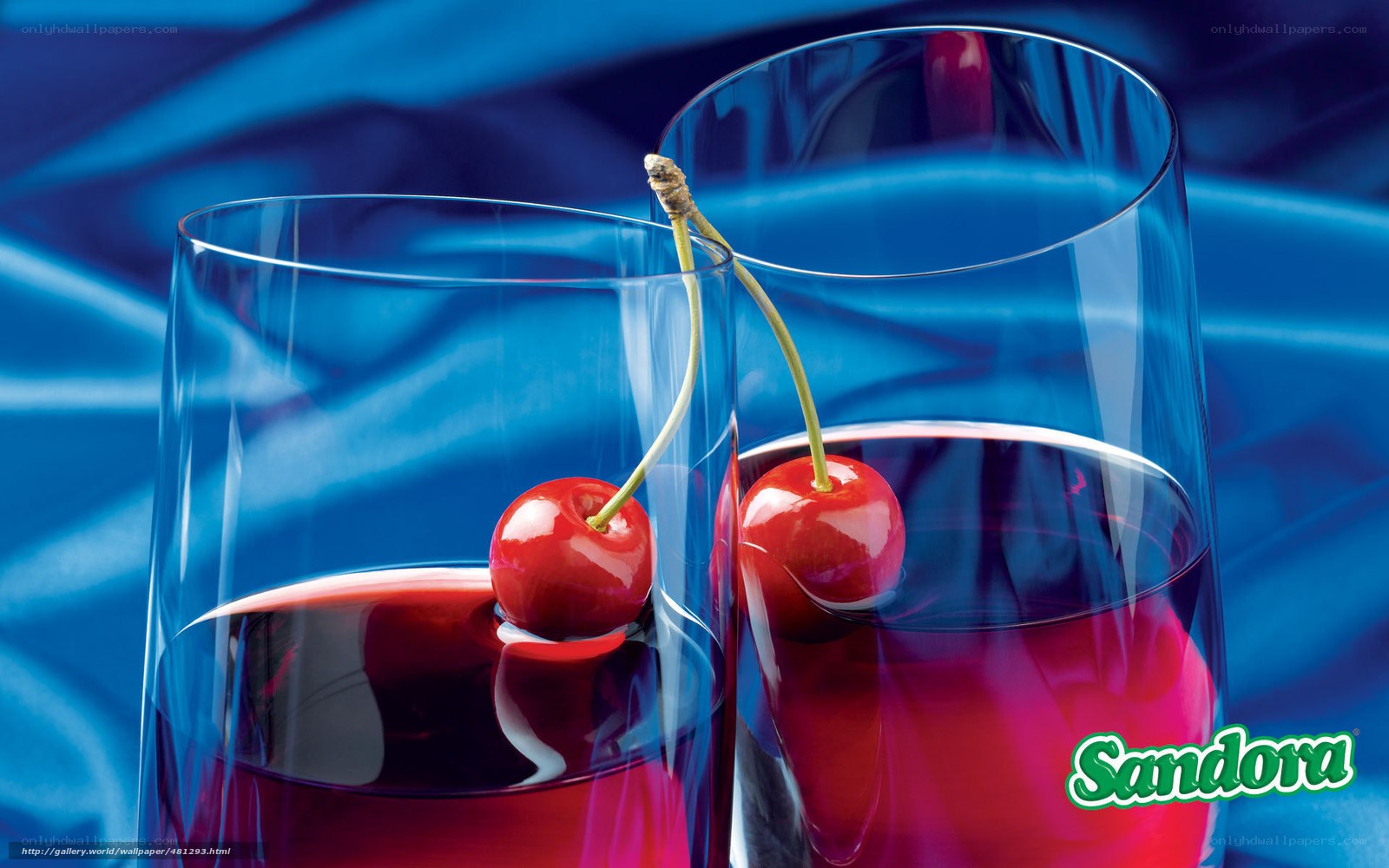 Cherries in glasses on blue