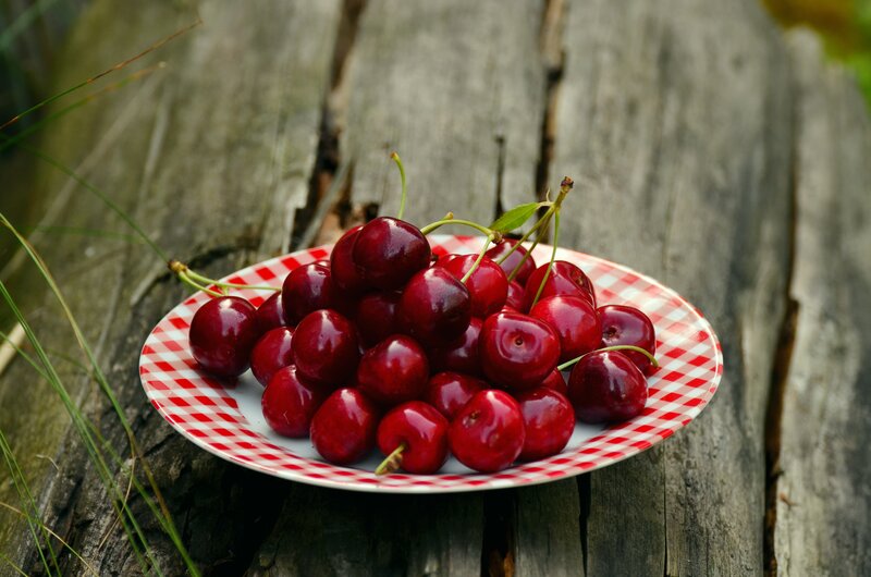Cherries on a checkered plate