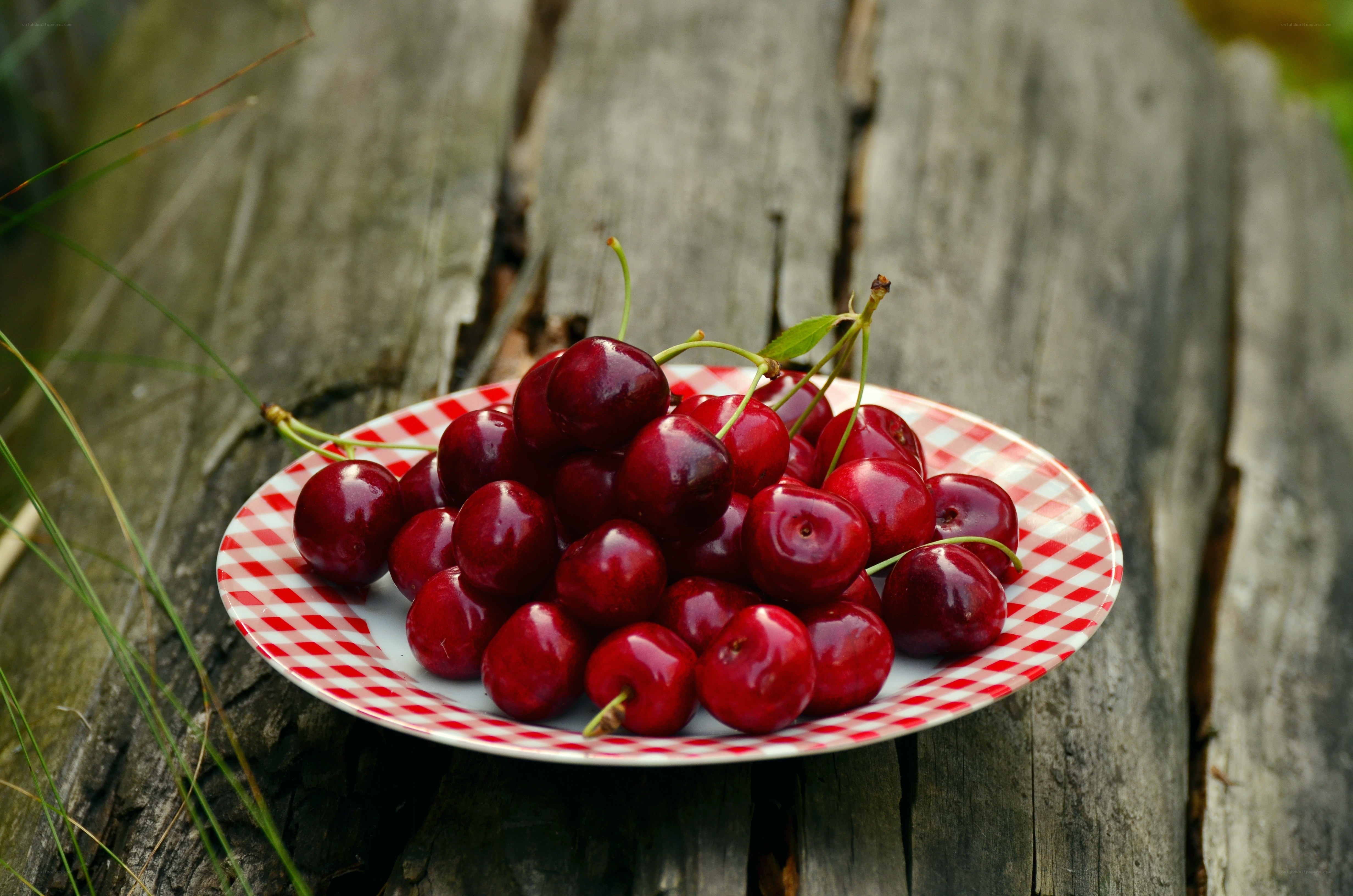Cherries on a checkered plate