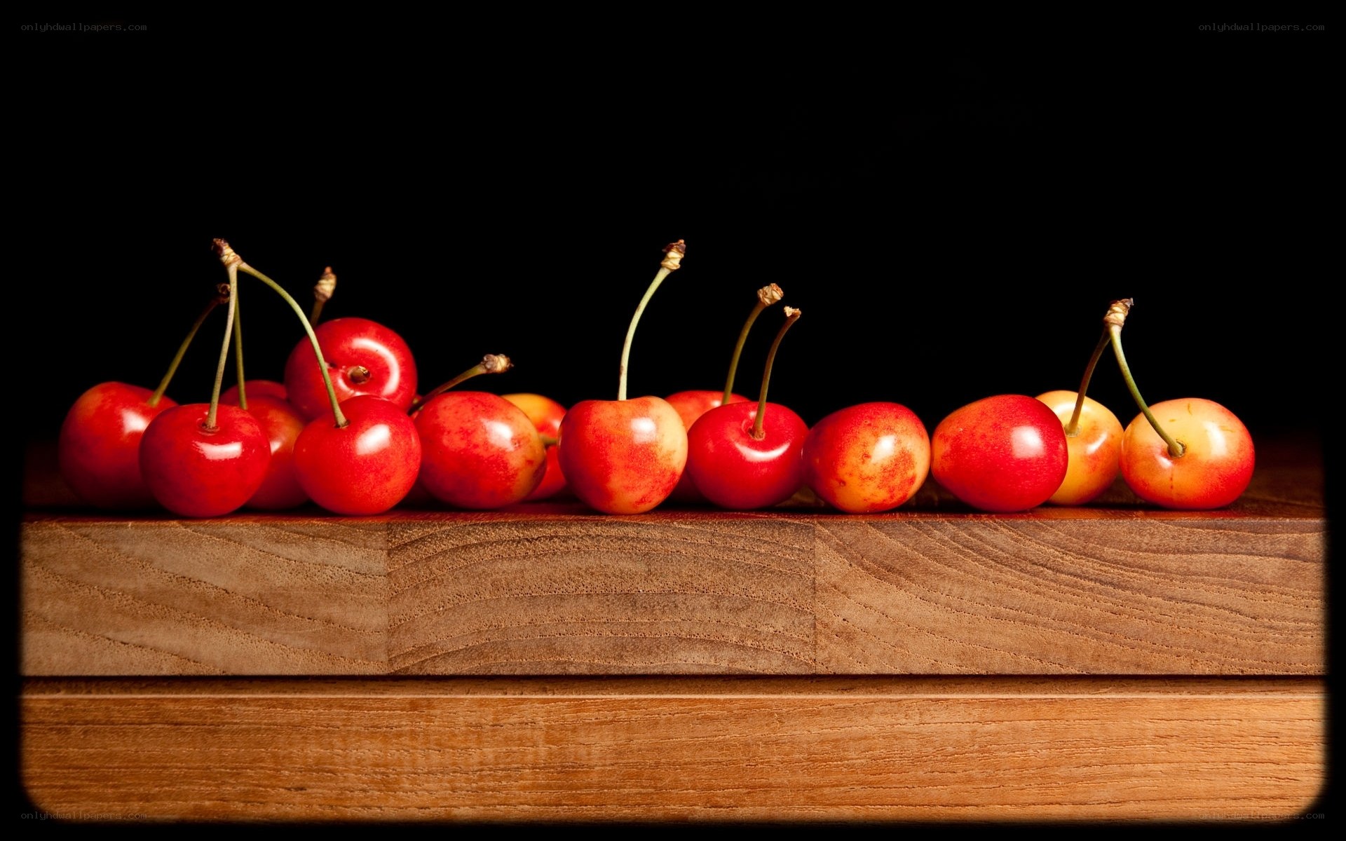 Cherries on a wooden board