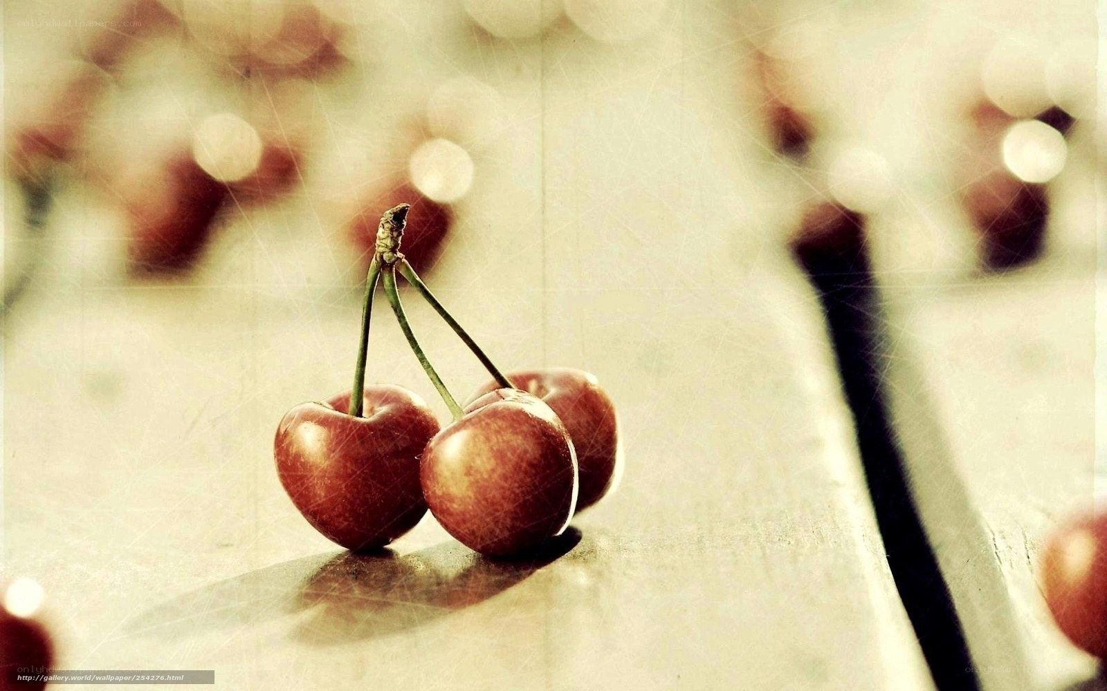 Cherries on a wooden surface