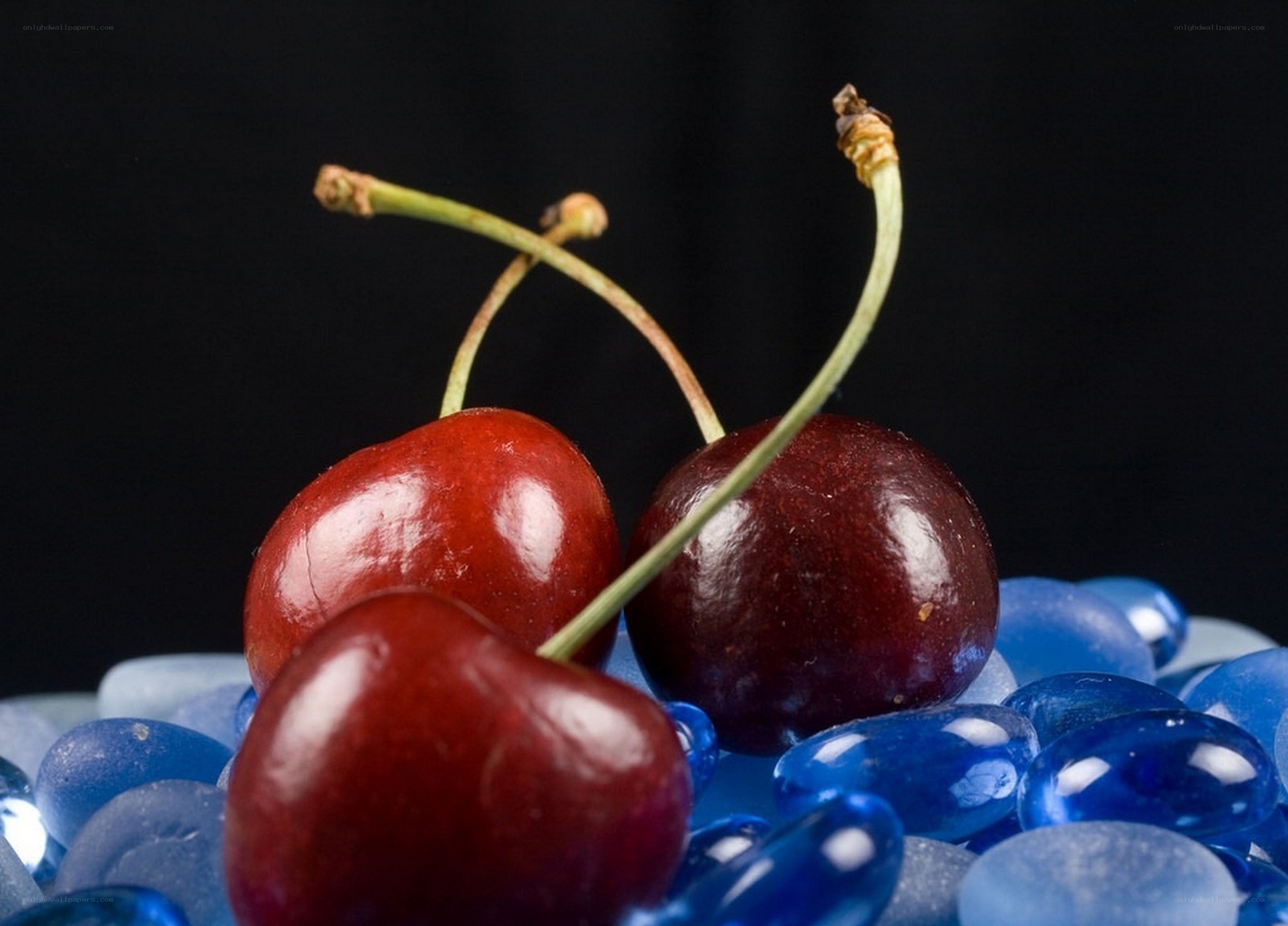 cherries on blue glass beads