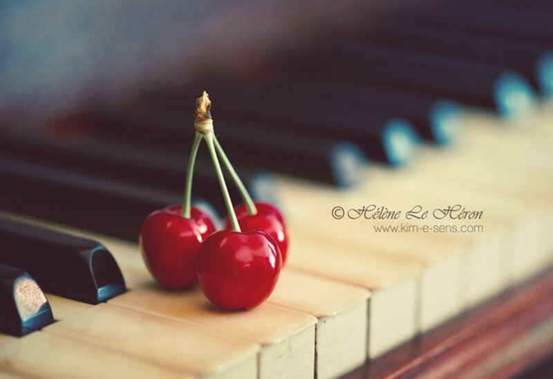 Cherries on Piano Keys