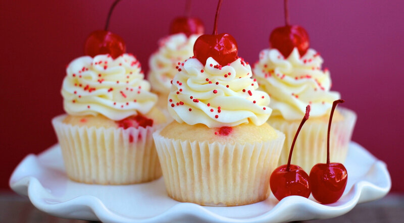 cherry cupcakes on a platter
