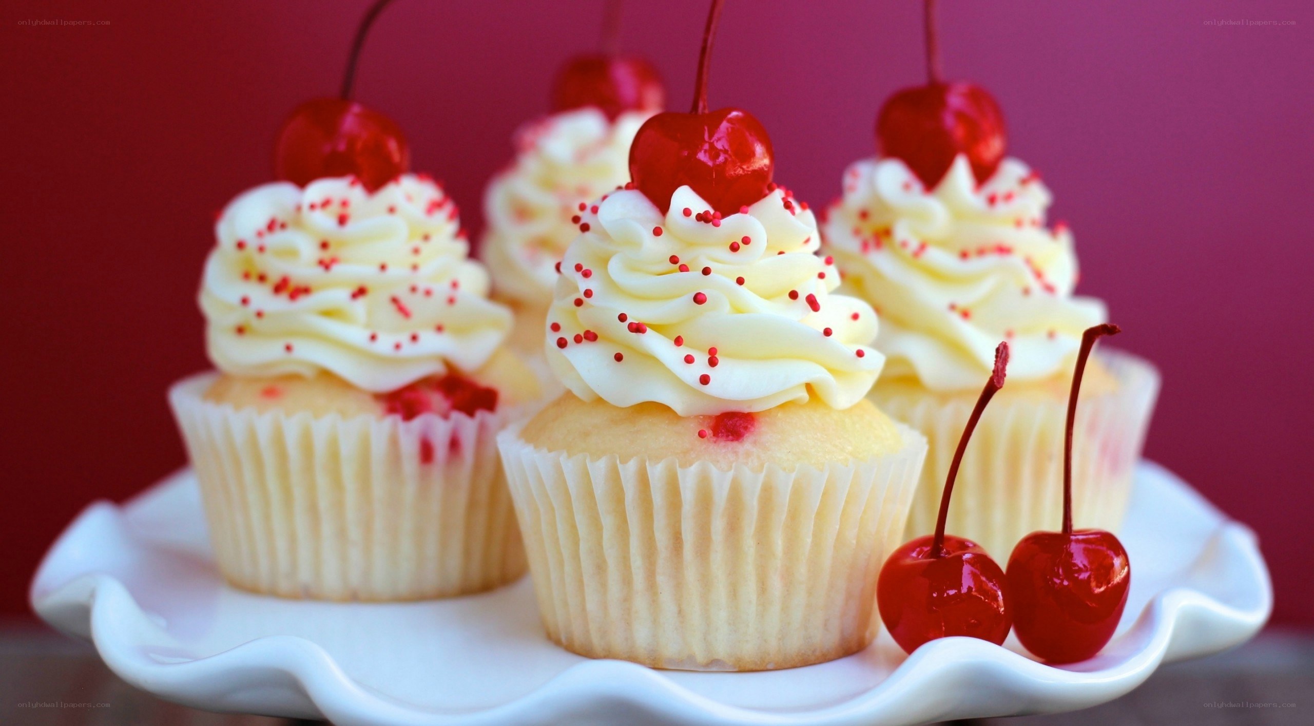 cherry cupcakes on a platter
