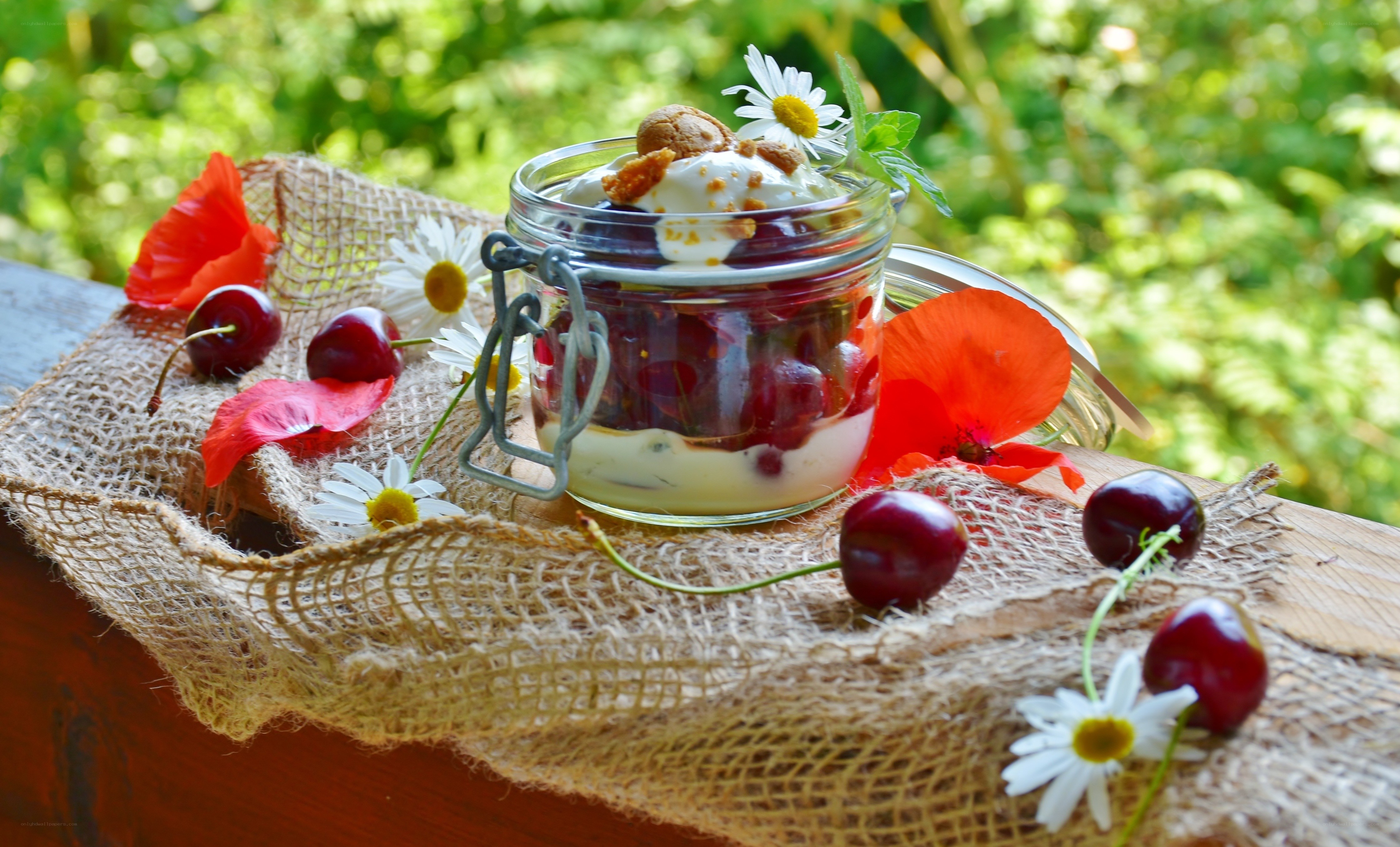 Cherry dessert in a jar