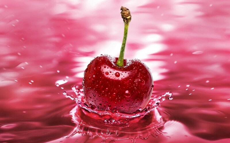 Cherry in Red Liquid — Dynamic, Photograph