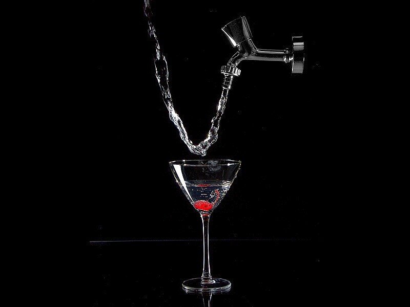 cherry martini being poured