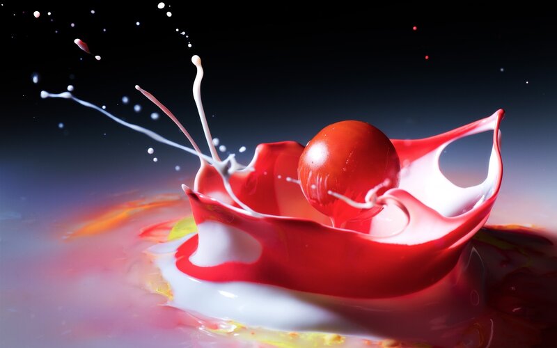 Cherry splashing in liquid