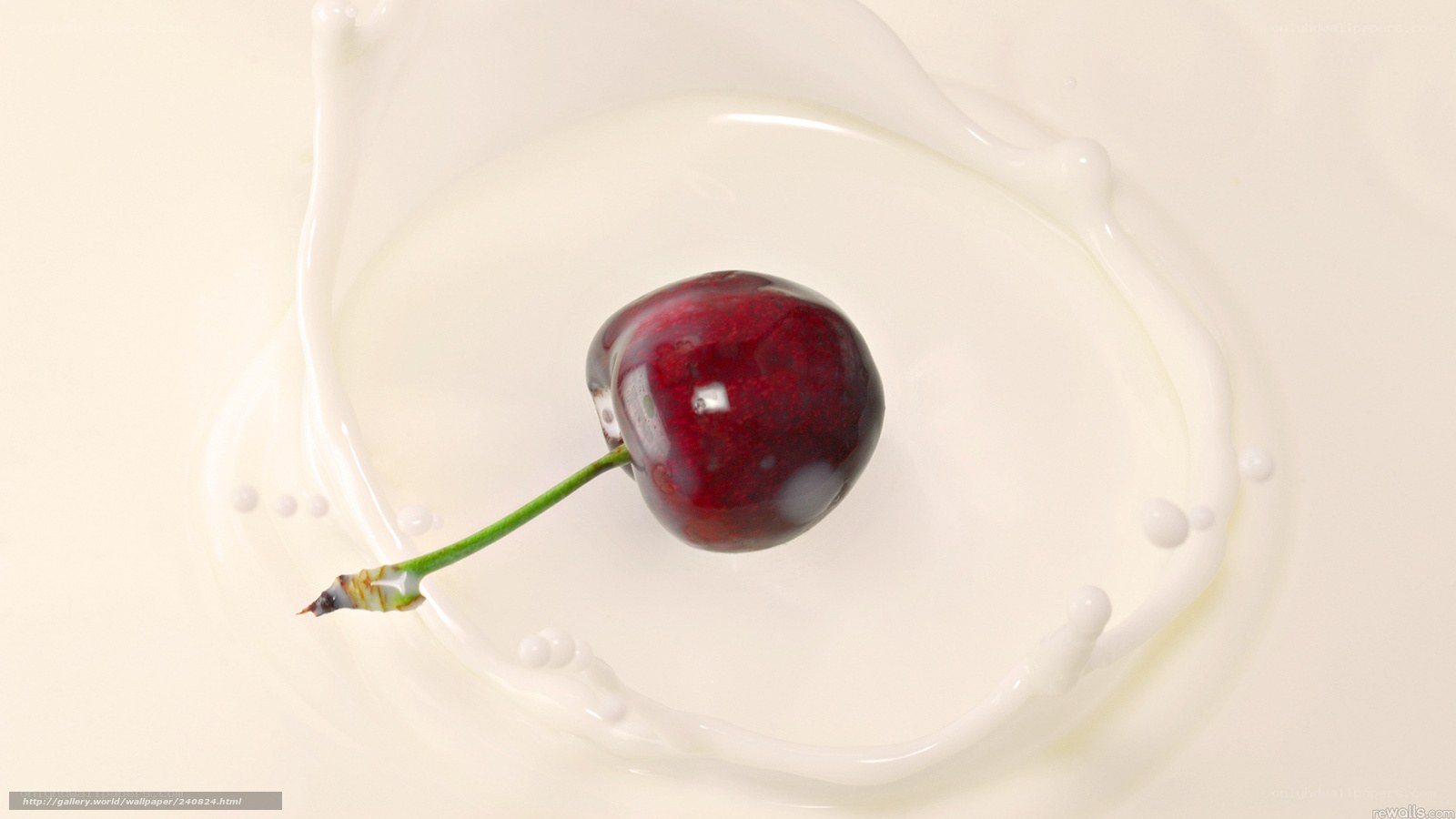 cherry splashing in milk