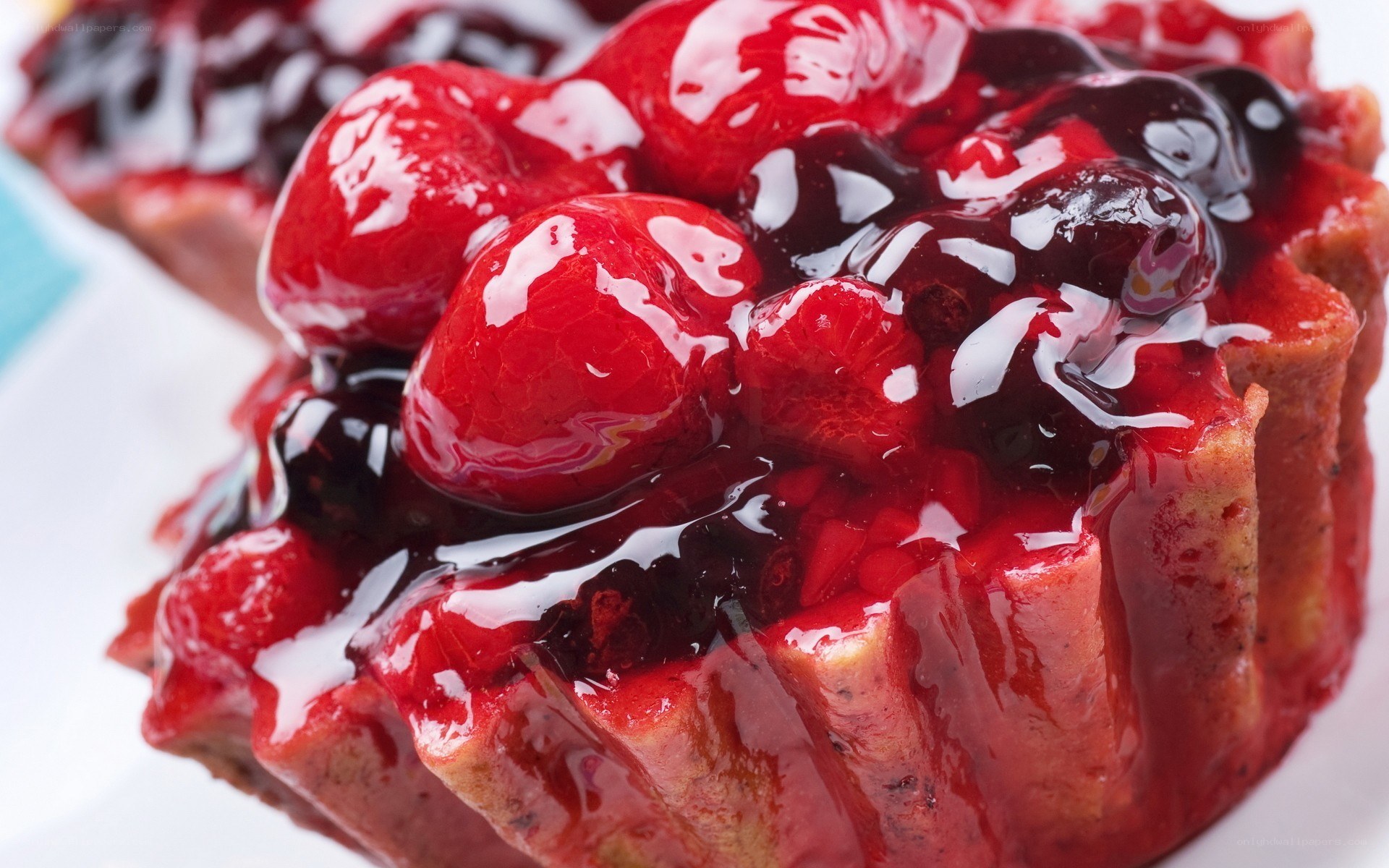 cherry tart with berry sauce
