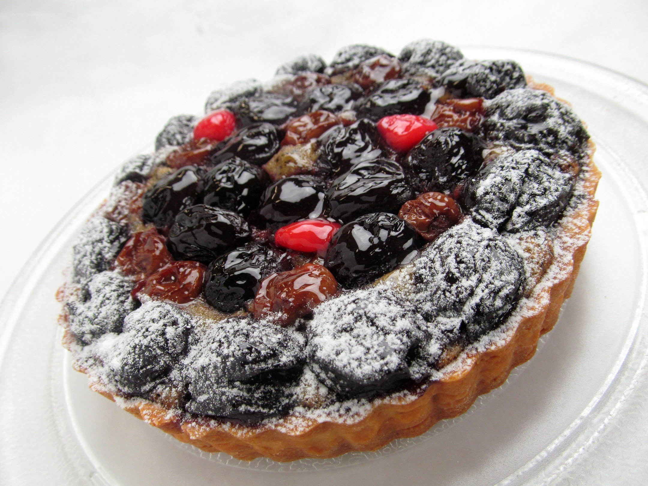 cherry tart with powdered sugar