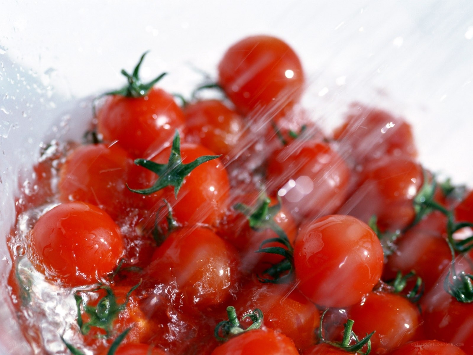 Cherry tomatoes being washed