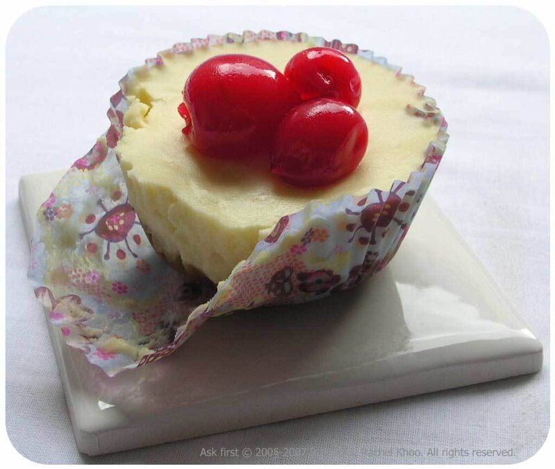 cherry-topped cheesecake cupcake