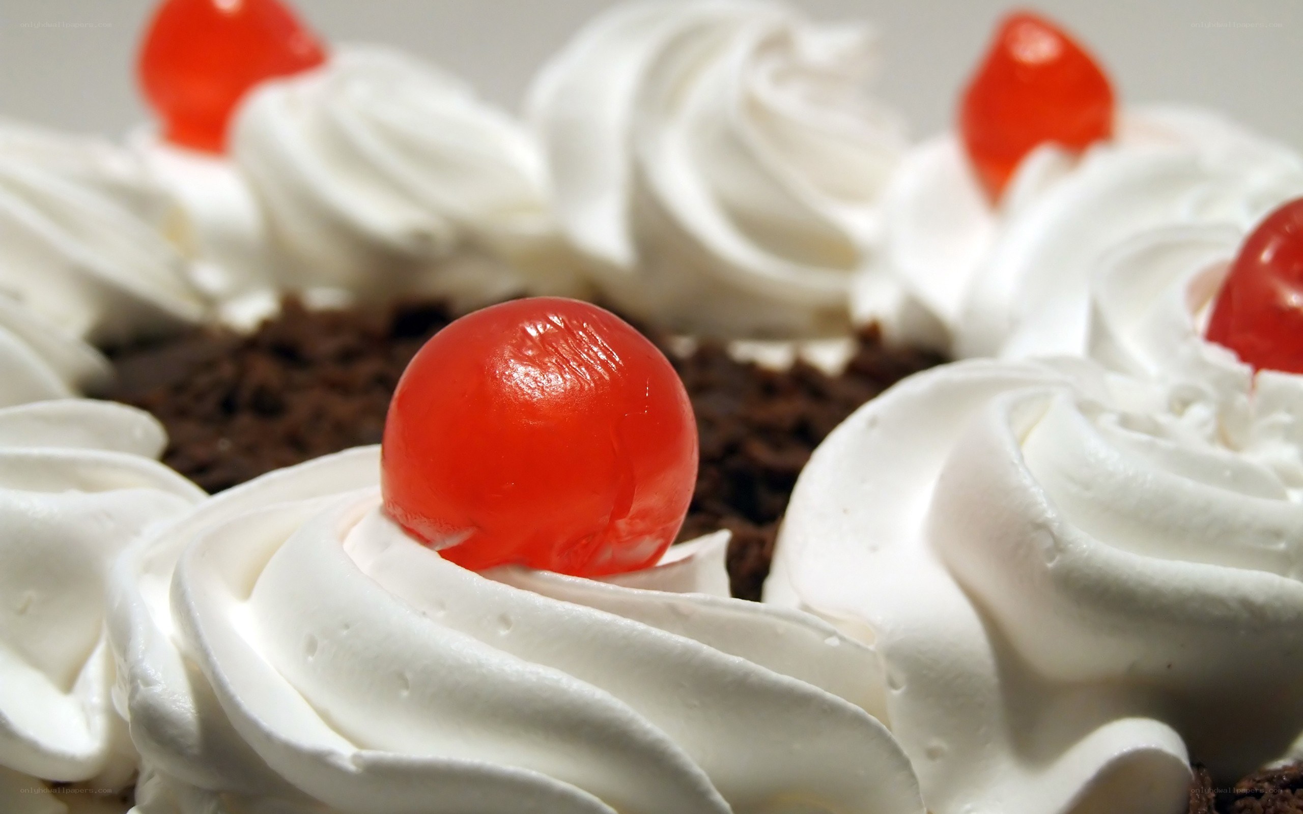 cherry-topped whipped cream dessert