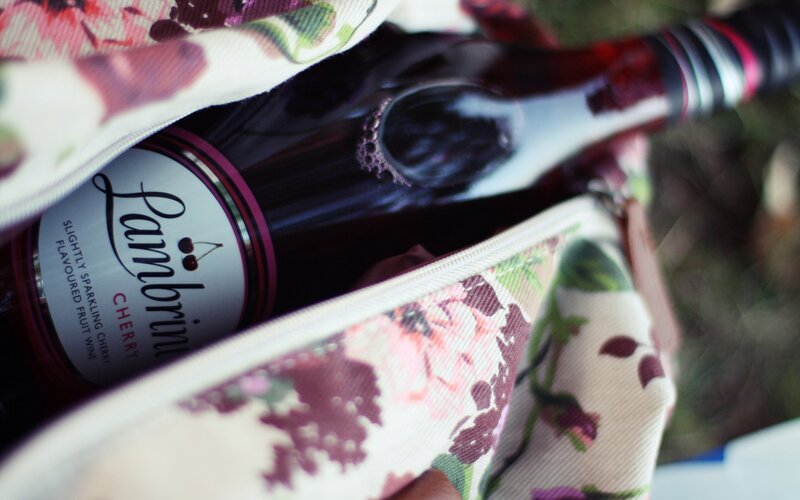 Cherry wine in a floral bag