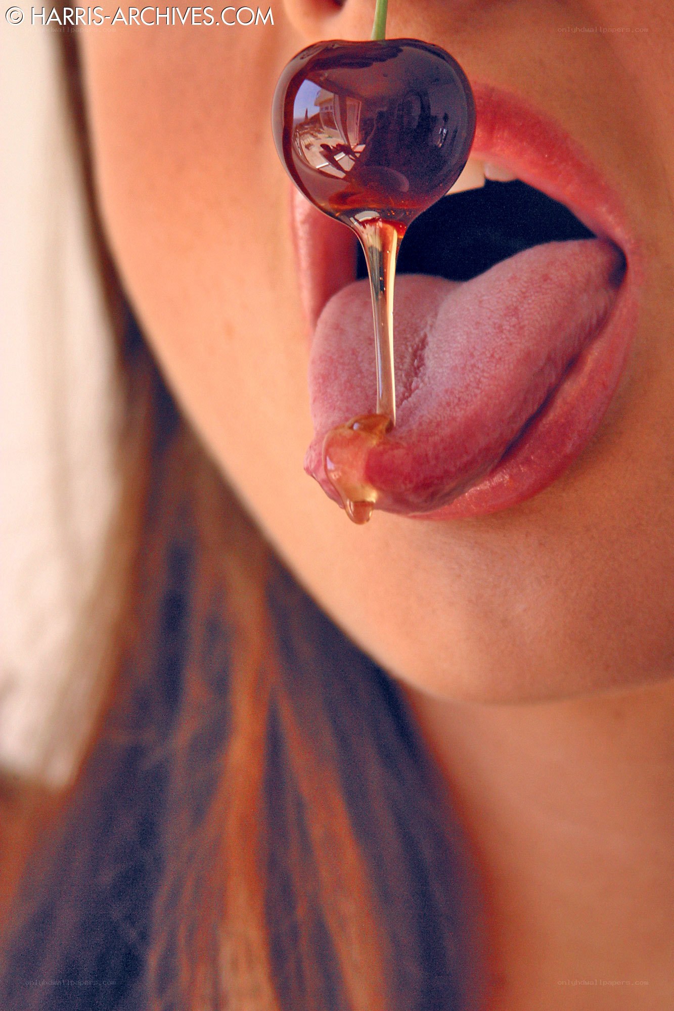 cherry with honey on tongue