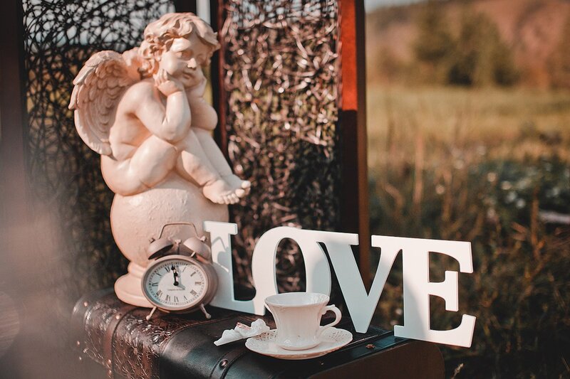 Cherub Statue on Suitcase