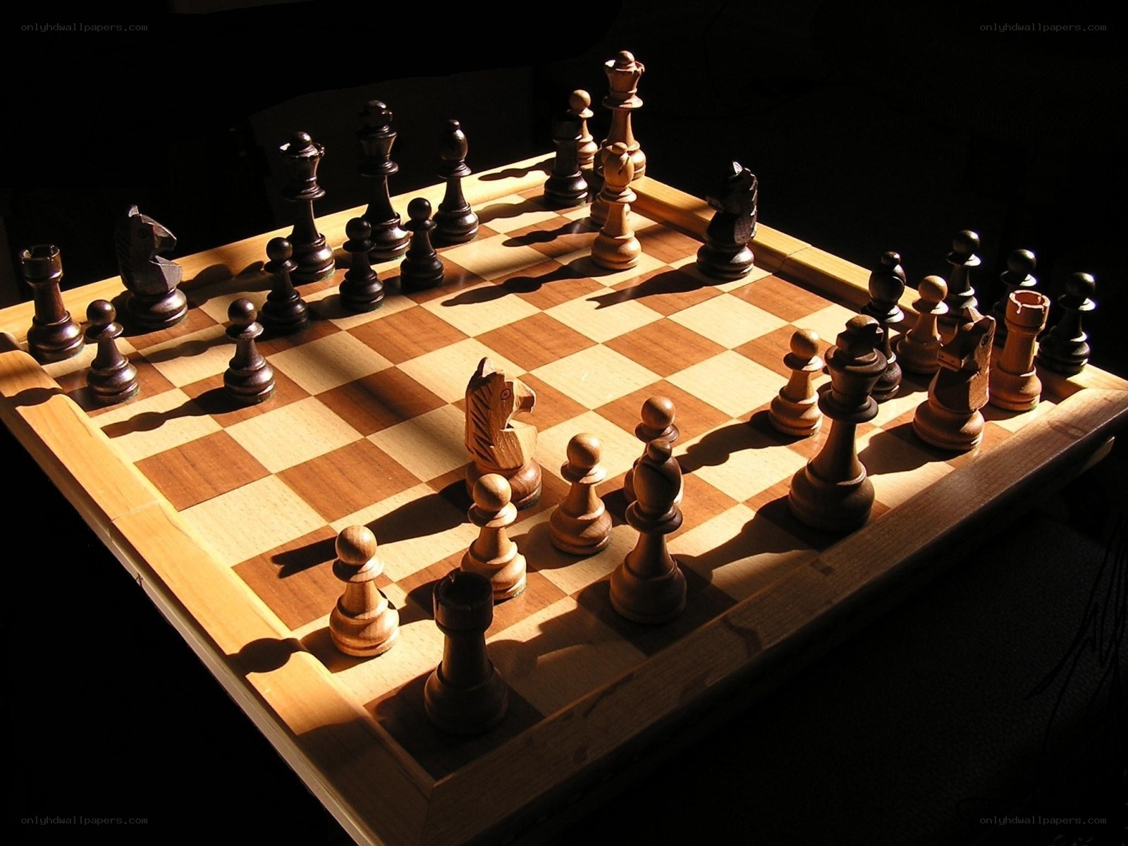 chess game in dramatic lighting