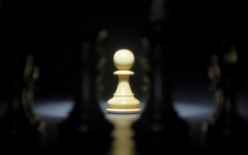chess pawn in spotlight